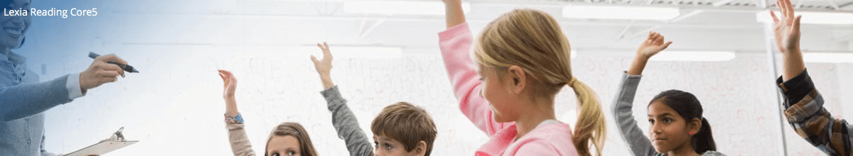 kids with hands up in a classroom