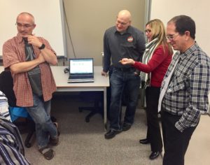 trustees watch robotics demo and ask questions